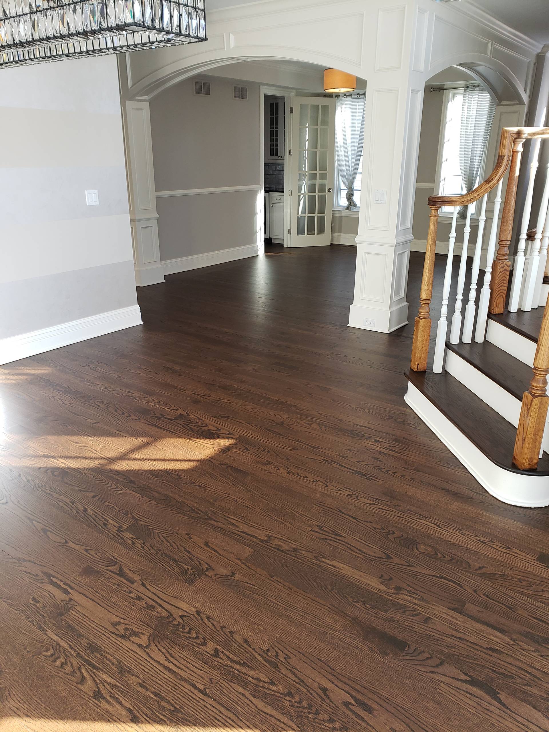 2 and 1/4 red oak select and better , Jacobean stain and 3 coats of Bona finish