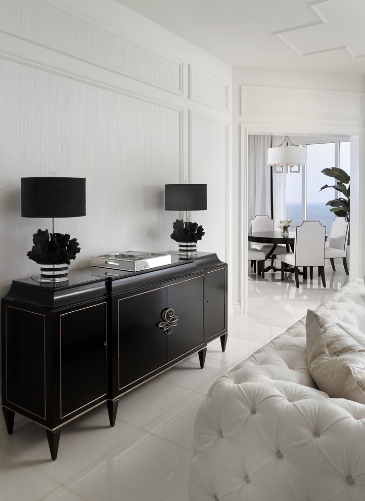 Design ideas for a large transitional formal enclosed living room in Miami with white walls and marble floors.
