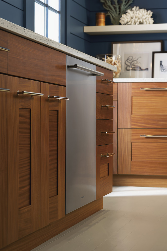 Example of a mid-sized transitional single-wall beige floor enclosed kitchen design in Miami with an undermount sink, shaker cabinets, medium tone wood cabinets, quartz countertops, stainless steel appliances and no island