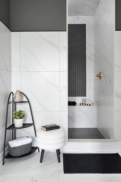 Black and White Shower Design with Brass Accents