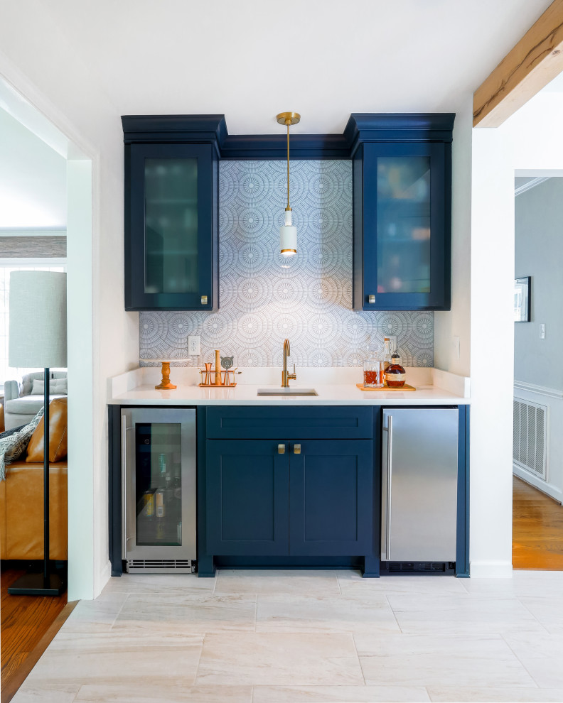 Modern single-wall wet bar in Other with an undermount sink, glass-front cabinets, blue cabinets, quartzite benchtops, multi-coloured splashback, mosaic tile splashback, ceramic floors, white floor and white benchtop.