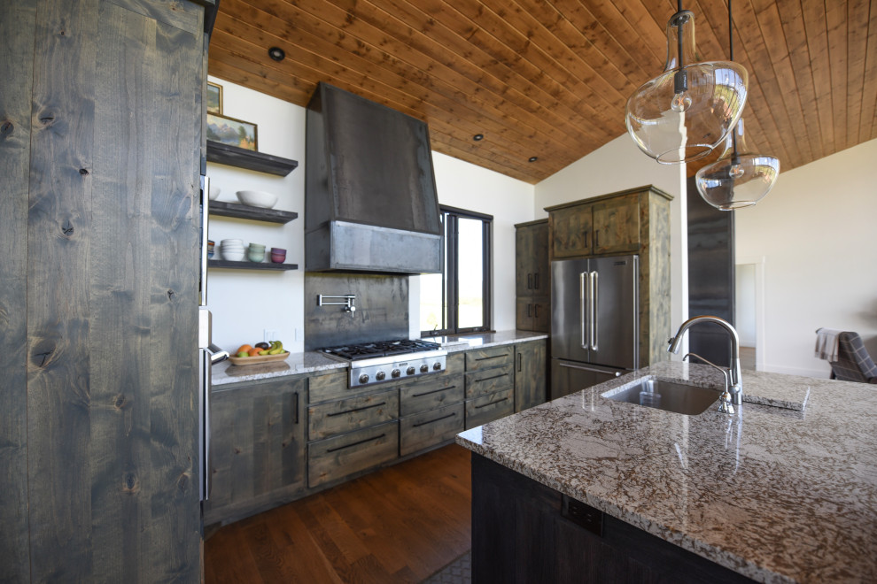 Inspiration for a rustic kitchen remodel with stainless steel appliances