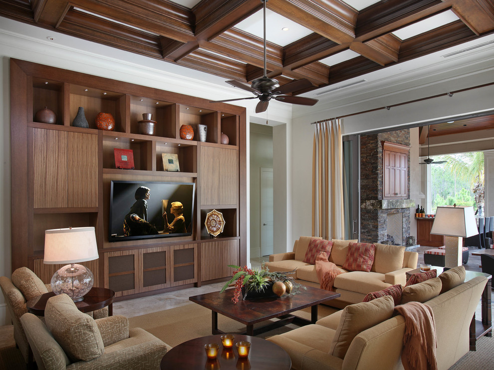 This is an example of a transitional family room in Miami with white walls.