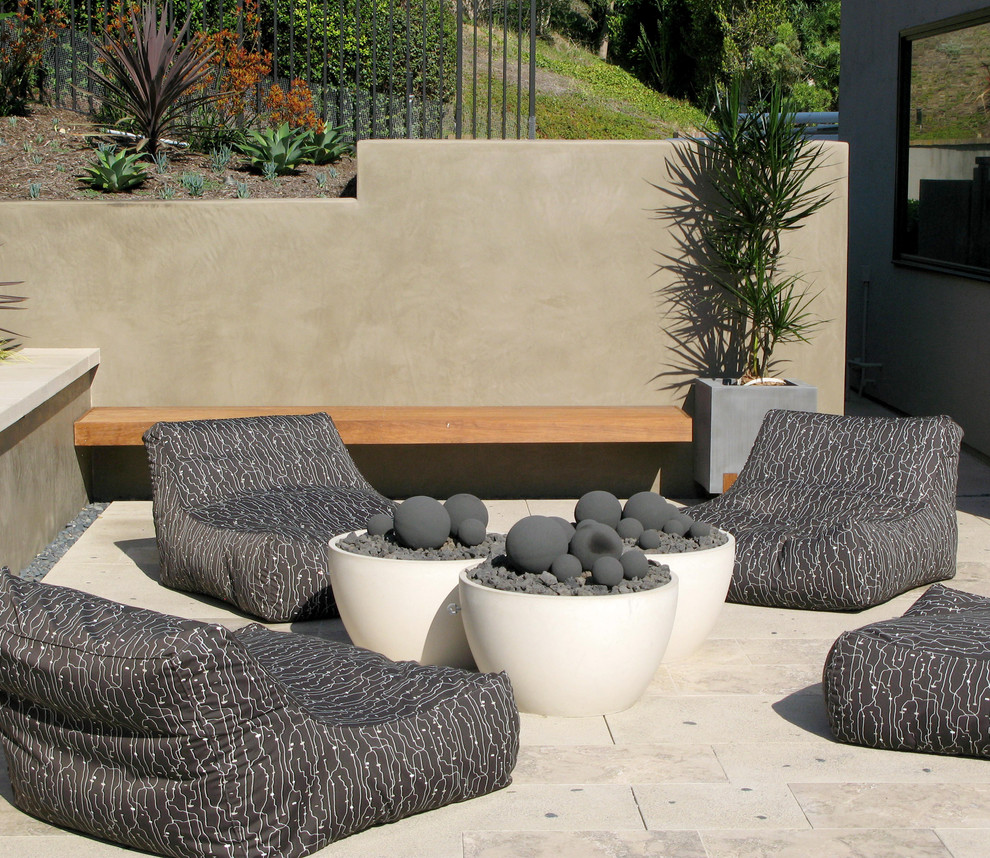 Inspiration for a contemporary patio in San Diego with a fire feature.