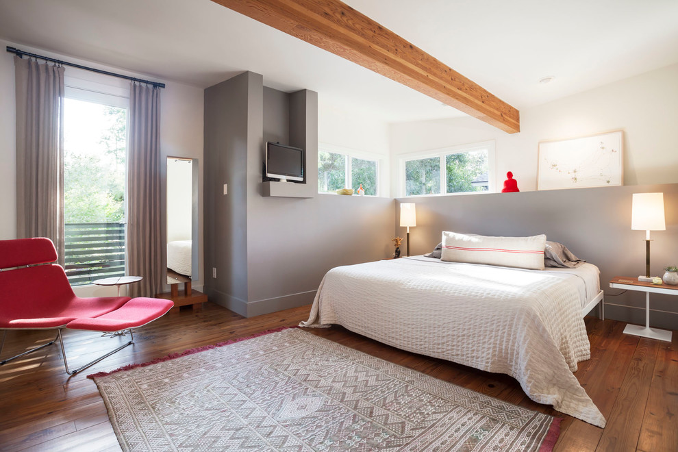 Example of a transitional bedroom design in Austin