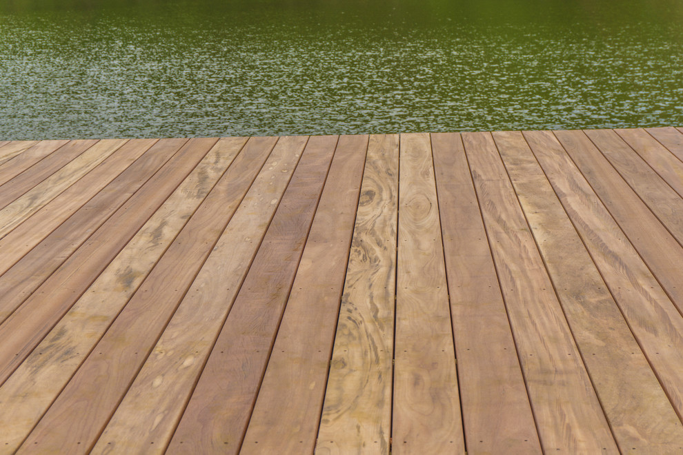 Inspiration for a large country backyard deck in Atlanta with with dock and no cover.