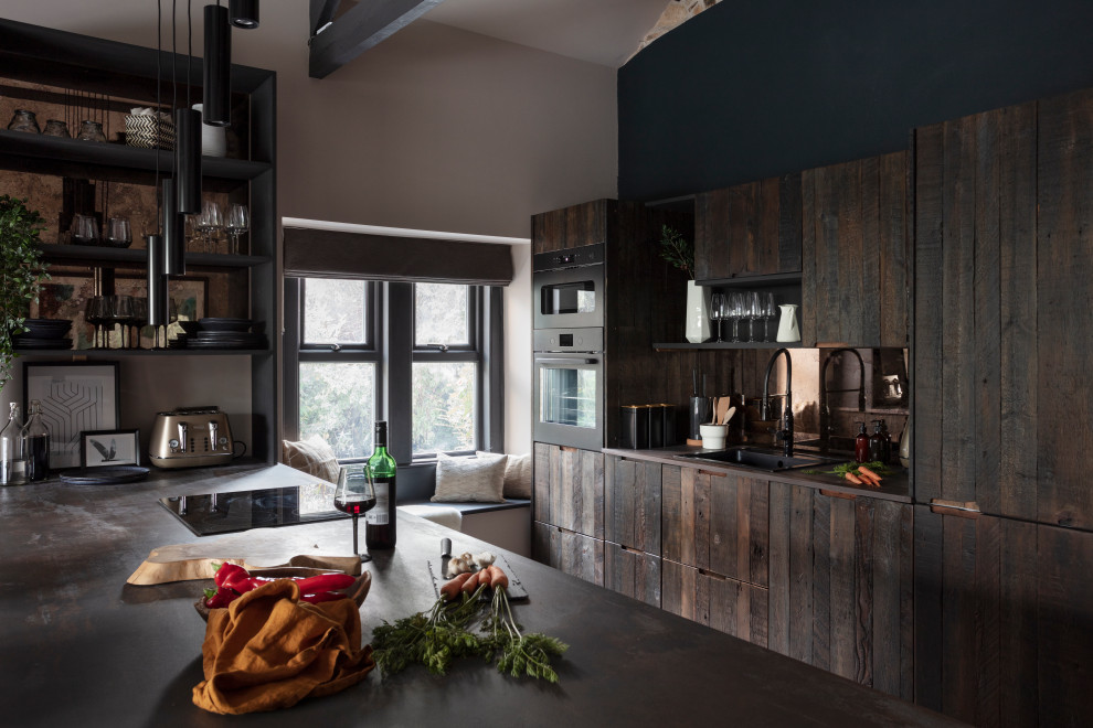 Photo of a mid-sized contemporary u-shaped kitchen in Other with a single-bowl sink, dark wood cabinets, solid surface benchtops, metallic splashback, mirror splashback, black appliances, a peninsula, flat-panel cabinets and brown benchtop.