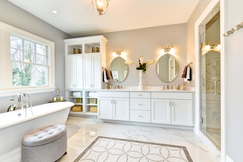 Freestanding bathtub - transitional master freestanding bathtub idea in DC Metro with shaker cabinets, white cabinets, an undermount sink and a hinged shower door