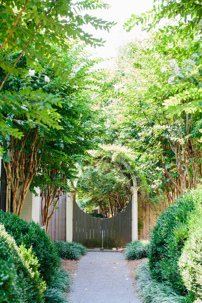Photo of a traditional side yard landscaping.