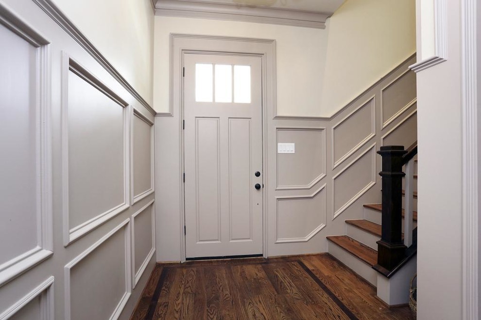 Design ideas for a large arts and crafts hallway in Denver with grey walls and medium hardwood floors.
