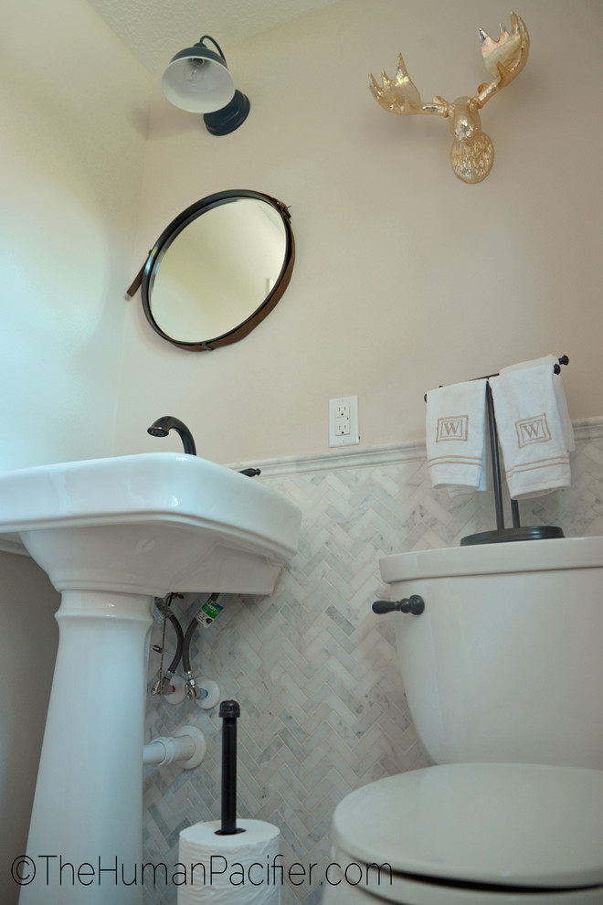 Design ideas for a transitional powder room in Houston.
