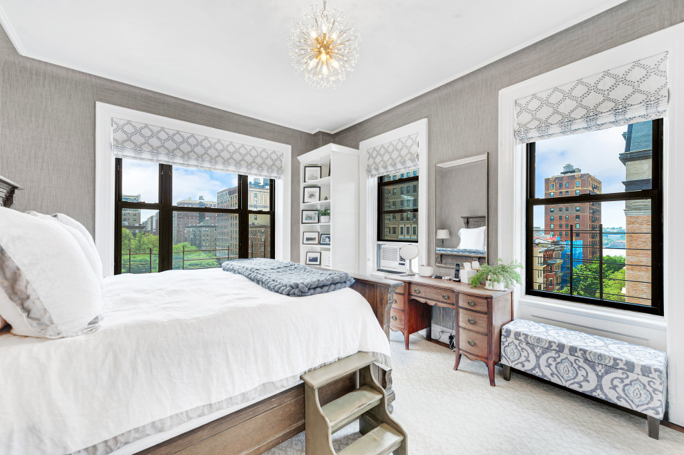 Design ideas for a transitional bedroom in New York with grey walls and wallpaper.