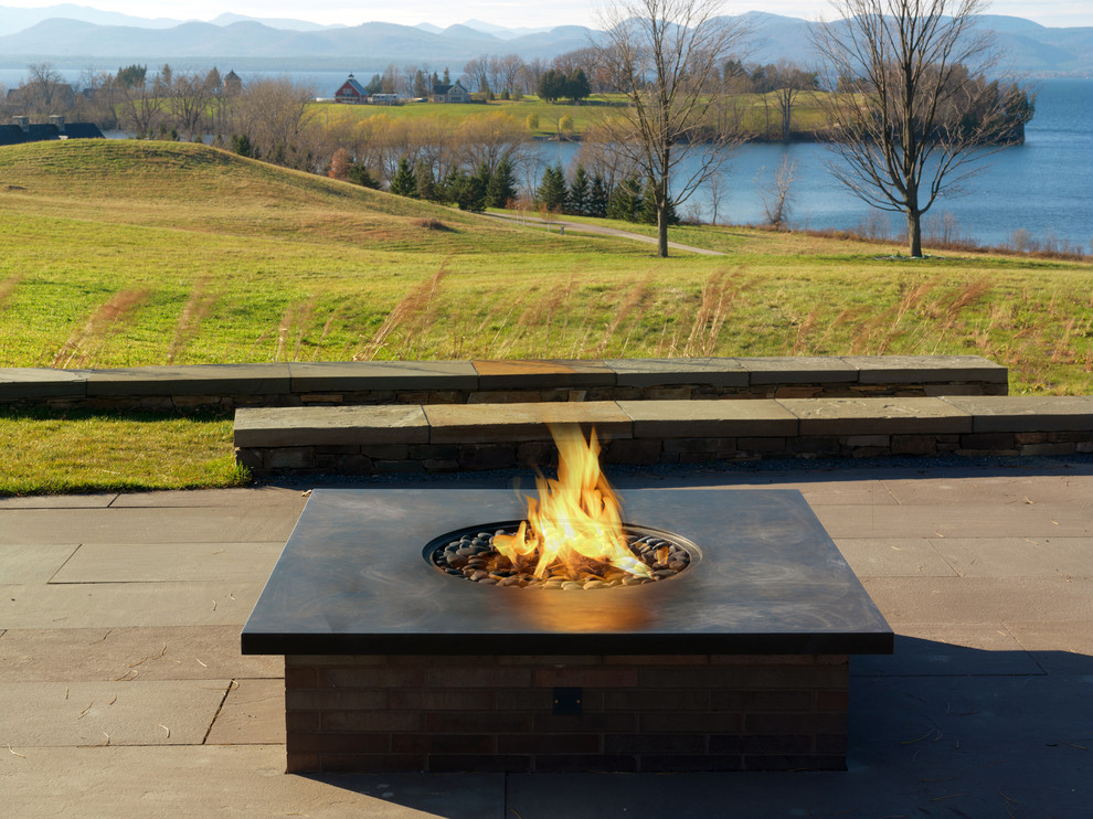 Inspiration for a contemporary patio in Burlington with a fire feature.