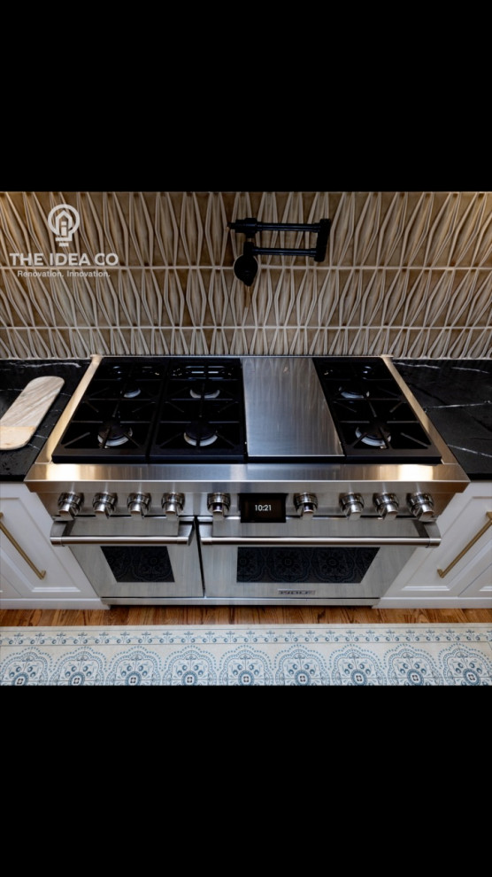Kitchen pantry - mid-sized transitional galley light wood floor and brown floor kitchen pantry idea with a single-bowl sink, recessed-panel cabinets, white cabinets, quartzite countertops, multicolored backsplash, ceramic backsplash, stainless steel appliances, an island and white countertops