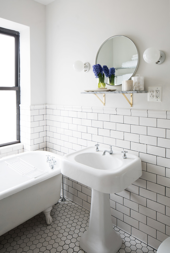 Inspiration for a transitional 3/4 bathroom in New York with a claw-foot tub, white tile, subway tile, white walls, a console sink and white floor.