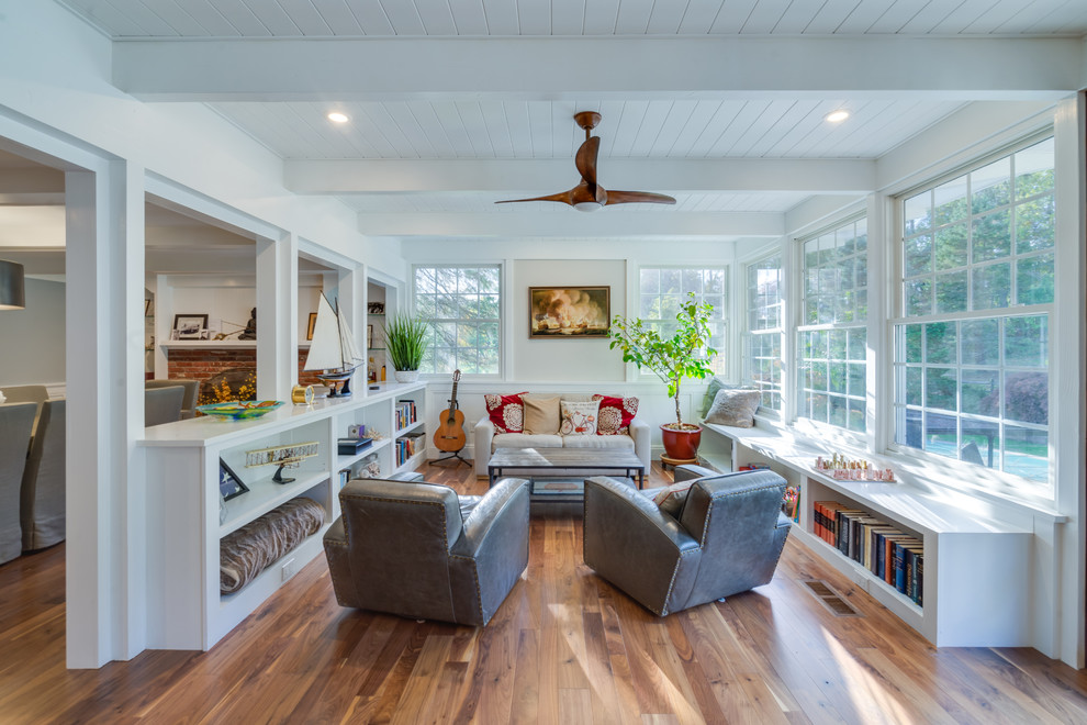 Contemporary open concept living room in Philadelphia with medium hardwood floors.