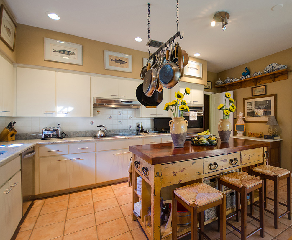 Inspiration for a rustic kitchen remodel in Miami