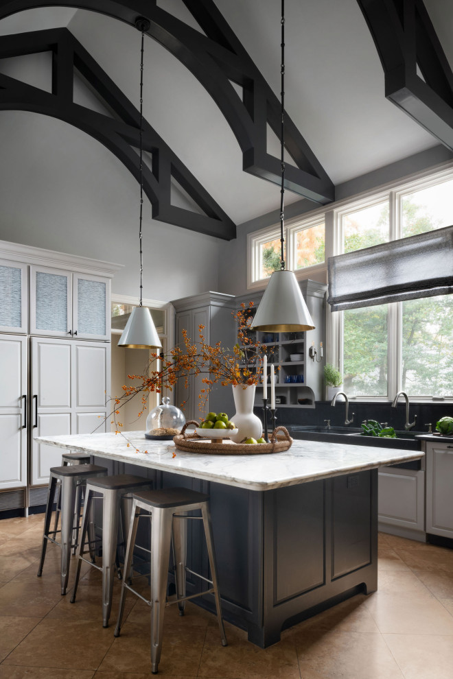 Design ideas for a transitional l-shaped kitchen in DC Metro with a farmhouse sink, raised-panel cabinets, grey cabinets, black splashback, panelled appliances, with island, brown floor, black benchtop, exposed beam and vaulted.