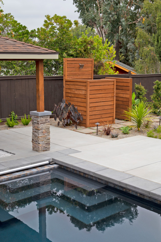 Photo of a large modern backyard patio in San Luis Obispo with an outdoor shower, concrete slab and a gazebo/cabana.