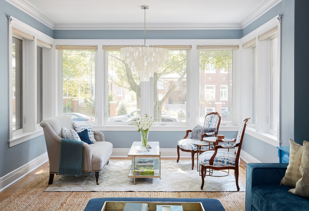 Photo of a traditional sunroom in Chicago with medium hardwood floors and brown floor.