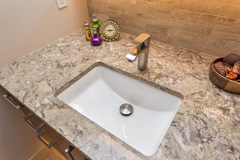 Doorless shower - mid-sized transitional master doorless shower idea with an undermount sink, flat-panel cabinets and dark wood cabinets
