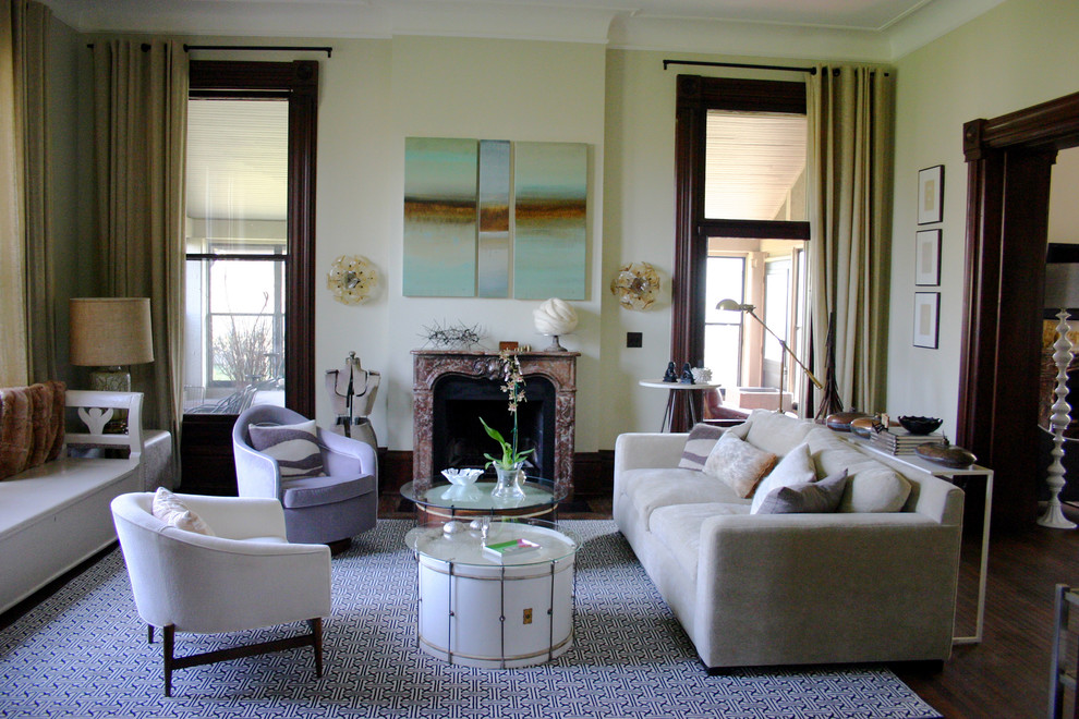 Design ideas for a large eclectic living room in Chicago with beige walls and a standard fireplace.