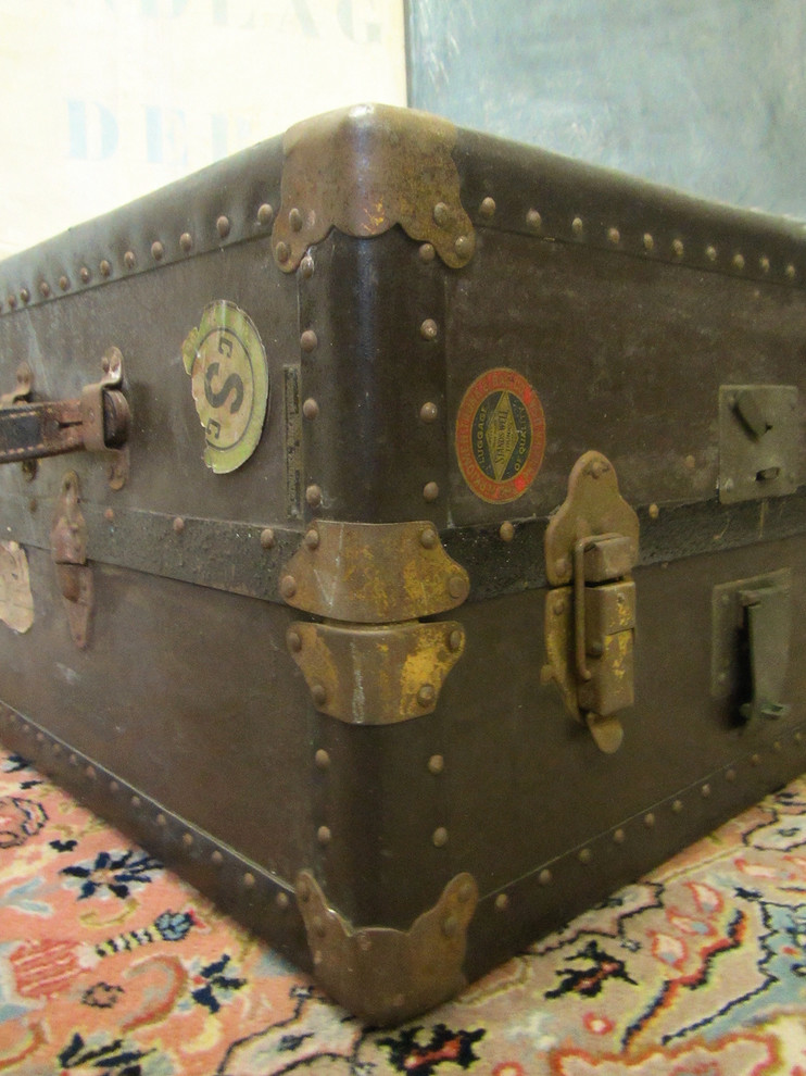 Old steamer trunk covered with stickers of various