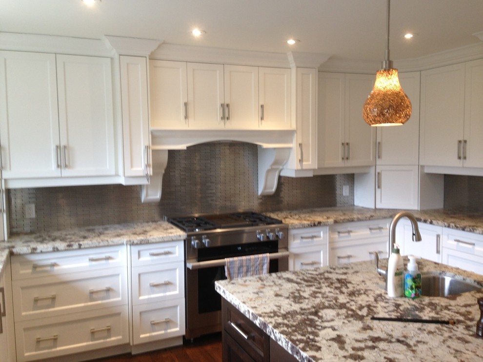 Example of a minimalist single-wall kitchen design in Toronto with an island