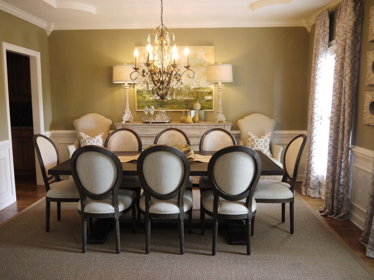 Photo of a transitional dining room in Other with green walls and medium hardwood floors.
