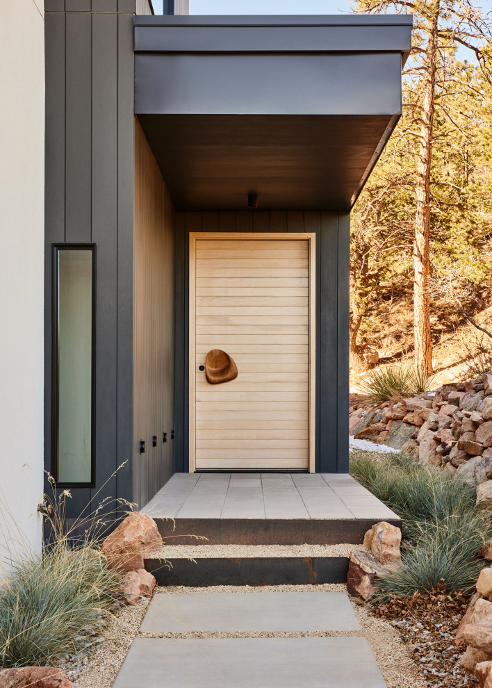 Inspiration for a midcentury entryway in Denver.