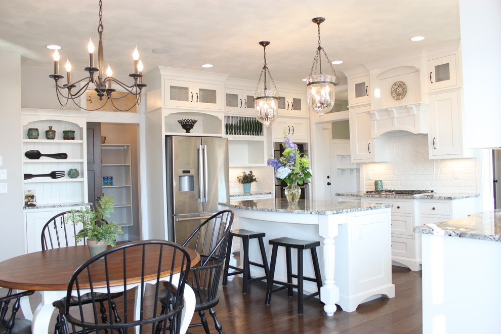 Traditional kitchen in Other with granite benchtops.
