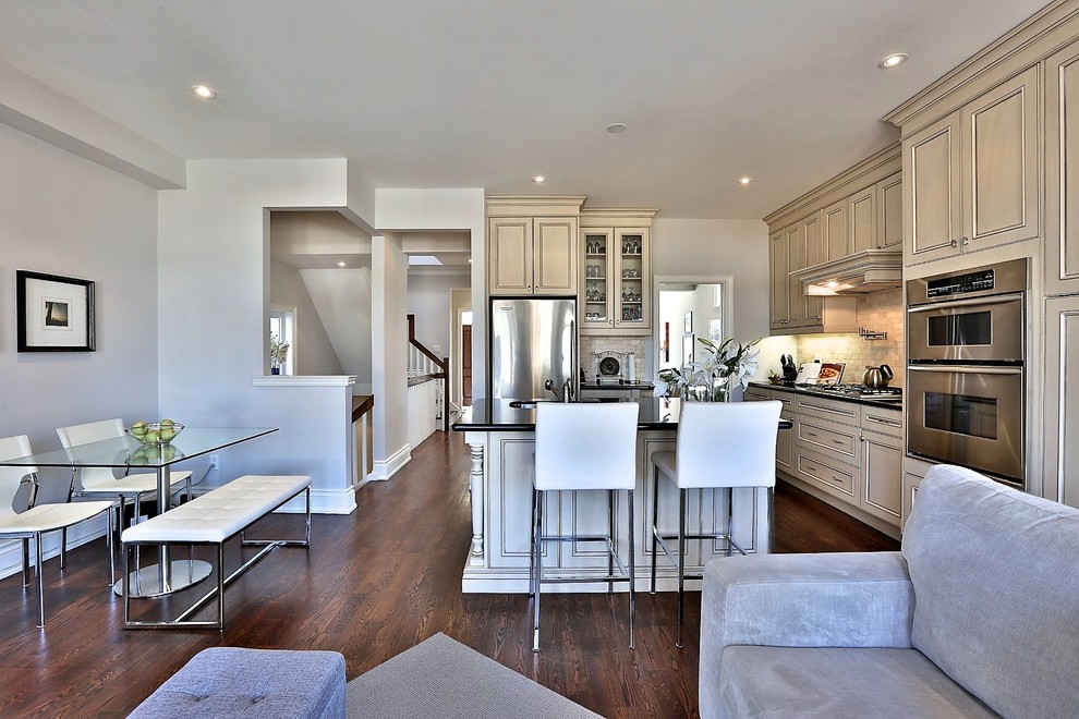 Example of a transitional kitchen design in Toronto