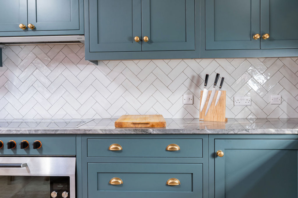 This is an example of a beach style kitchen in Cornwall.