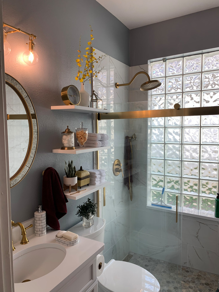 Small elegant 3/4 white tile and porcelain tile ceramic tile, beige floor and single-sink bathroom photo in Orlando with recessed-panel cabinets, white cabinets, a one-piece toilet, gray walls, an undermount sink, quartz countertops, white countertops, a niche and a built-in vanity