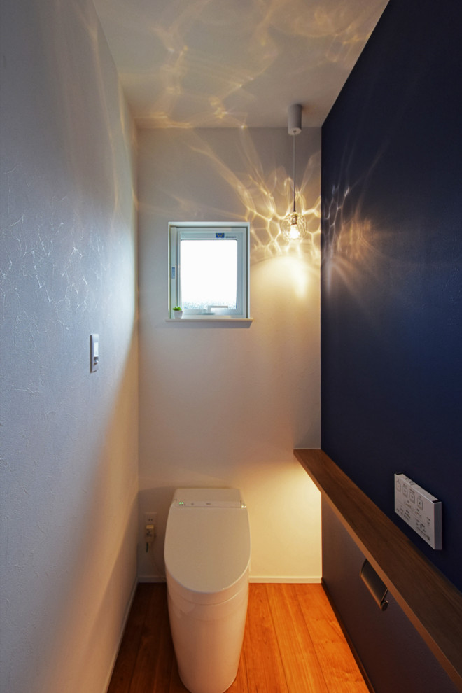 Inspiration for a modern cloakroom in Other.