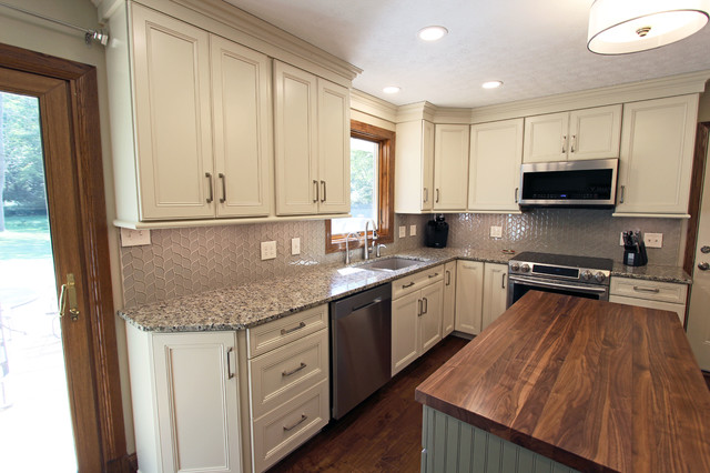 Cream Kitchen With Green Island With Butcher Block Countertop