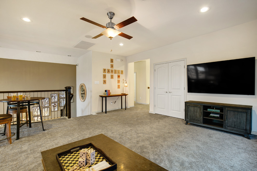 Inspiration for a large loft-style family room in Dallas with a game room, beige walls and carpet.