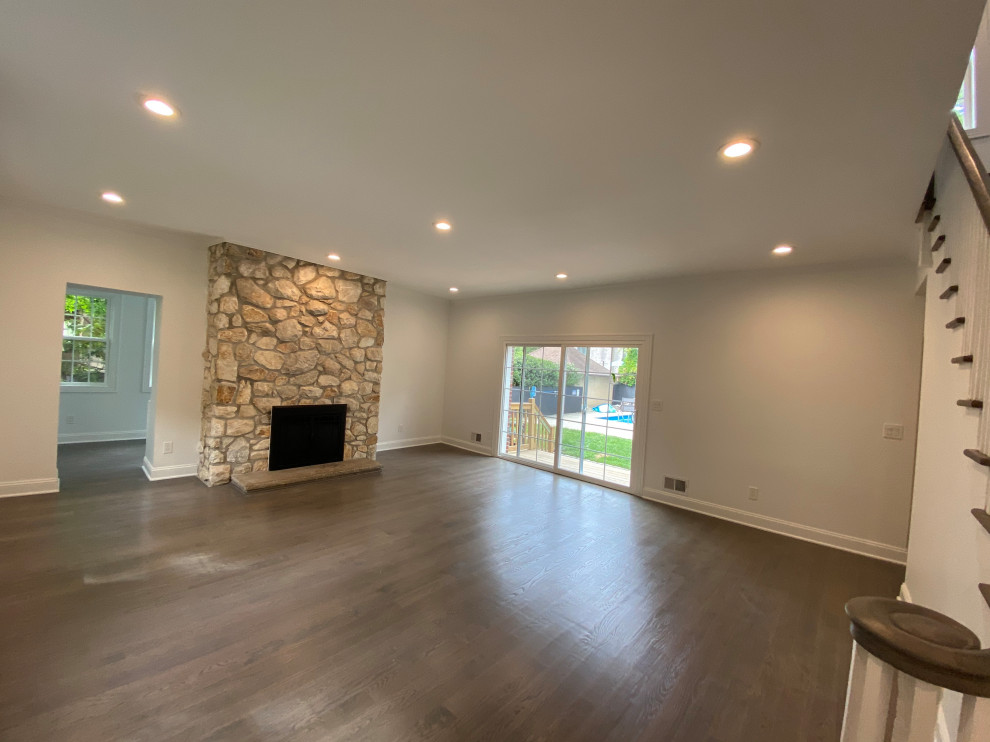 Floor-to-Ceiling Stone Fireplace Living Room