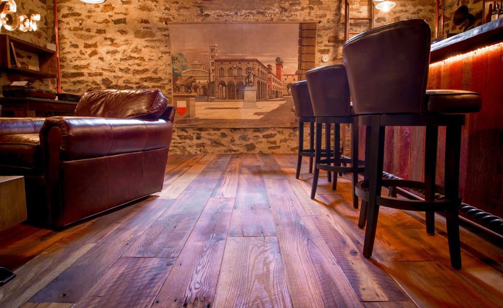 Country home bar in New York with medium hardwood floors.