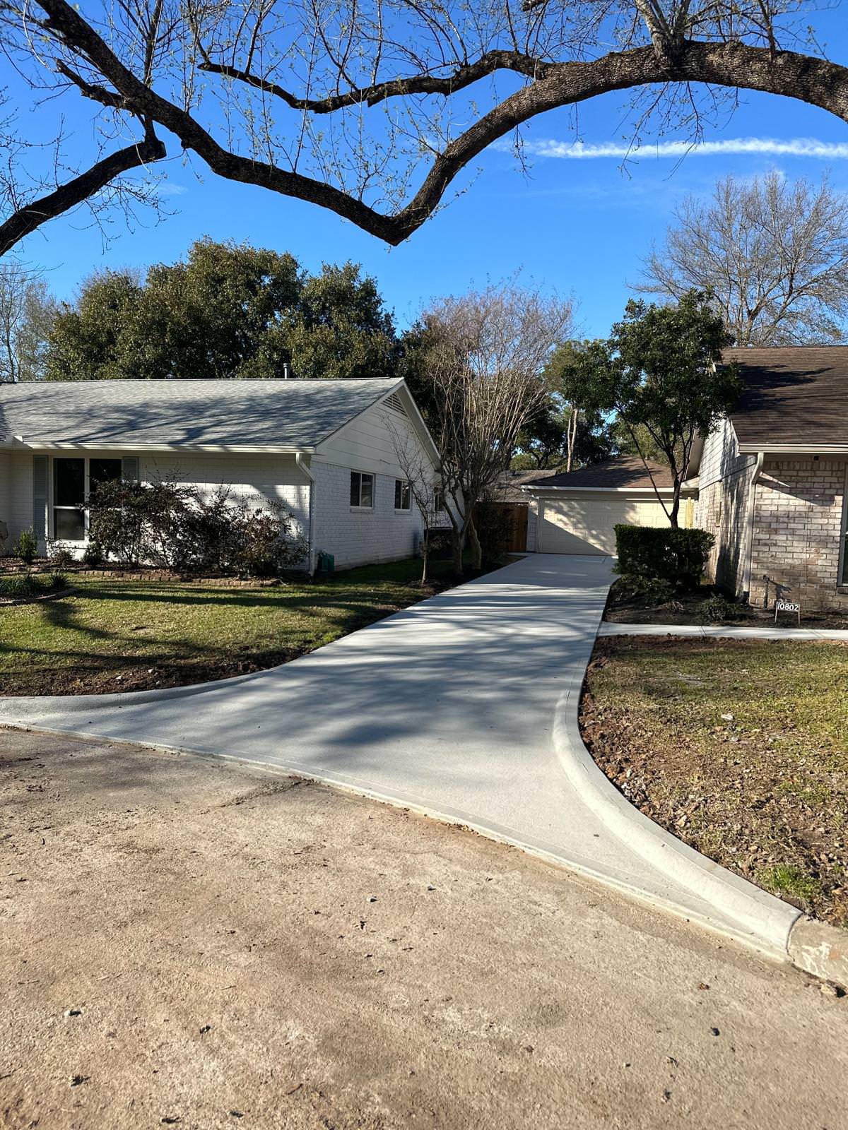 New driveway with sidewalks and stamped concrete!
