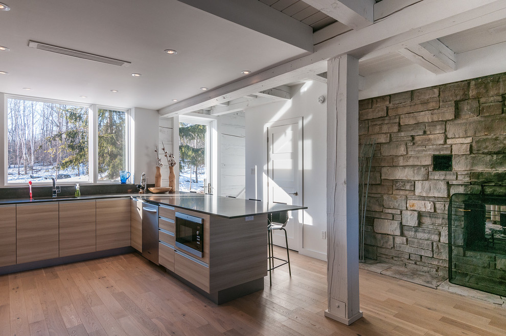 Example of a transitional home design design in Toronto