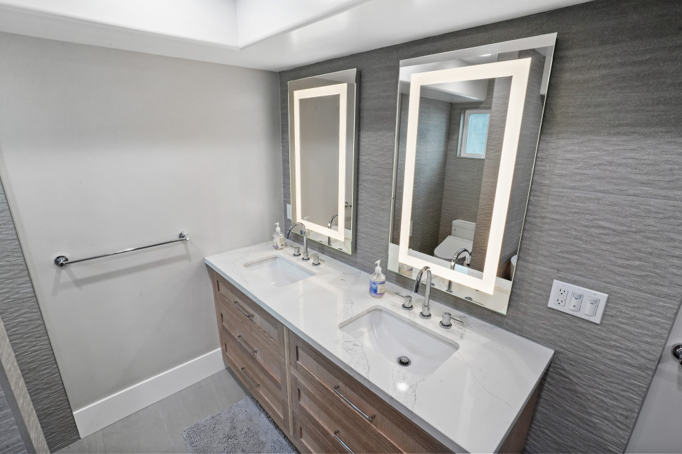 Inspiration for a large modern master bathroom in Orange County with beaded inset cabinets, light wood cabinets, a drop-in tub, a bidet, white tile, slate, white walls, cement tiles, quartzite benchtops, an open shower, white benchtops, a single vanity and a built-in vanity.