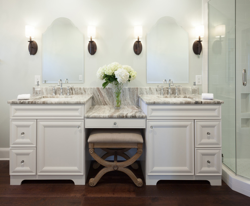 Inspiration for a large transitional master bathroom in Other with beaded inset cabinets, white cabinets, a corner shower, white tile, subway tile, white walls, dark hardwood floors, an undermount sink, engineered quartz benchtops and a freestanding tub.