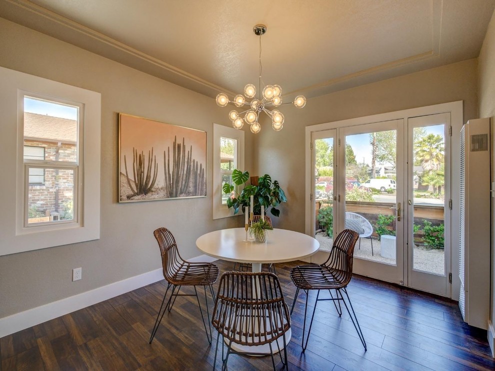 Mid-sized contemporary separate dining room in Other with no fireplace, beige walls, dark hardwood floors and brown floor.