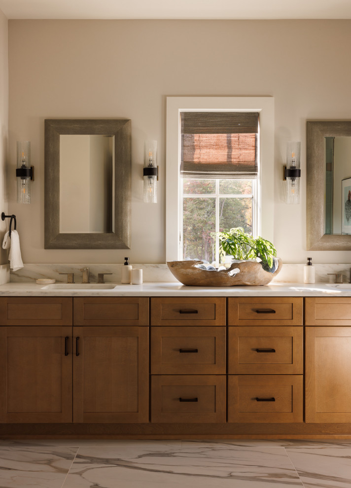 Bathroom - large transitional master porcelain tile, white floor and double-sink bathroom idea in New York with shaker cabinets, medium tone wood cabinets, white walls, quartz countertops, white countertops and a built-in vanity