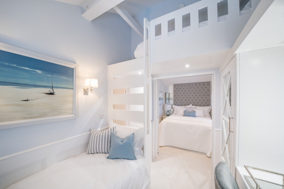 Design ideas for a small nautical master bedroom in Other with grey walls, carpet, no fireplace, grey floors, a vaulted ceiling and wainscoting.