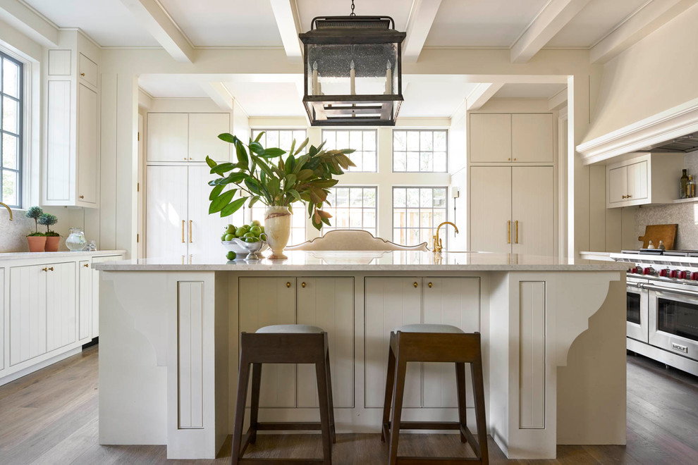 Large transitional u-shaped medium tone wood floor eat-in kitchen photo in Dallas with an undermount sink, flat-panel cabinets, white cabinets, quartz countertops, multicolored backsplash, mosaic tile backsplash, paneled appliances and an island