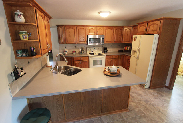 Gray Corian Countertop And Gray Tile Backsplash Wadsworth Oh