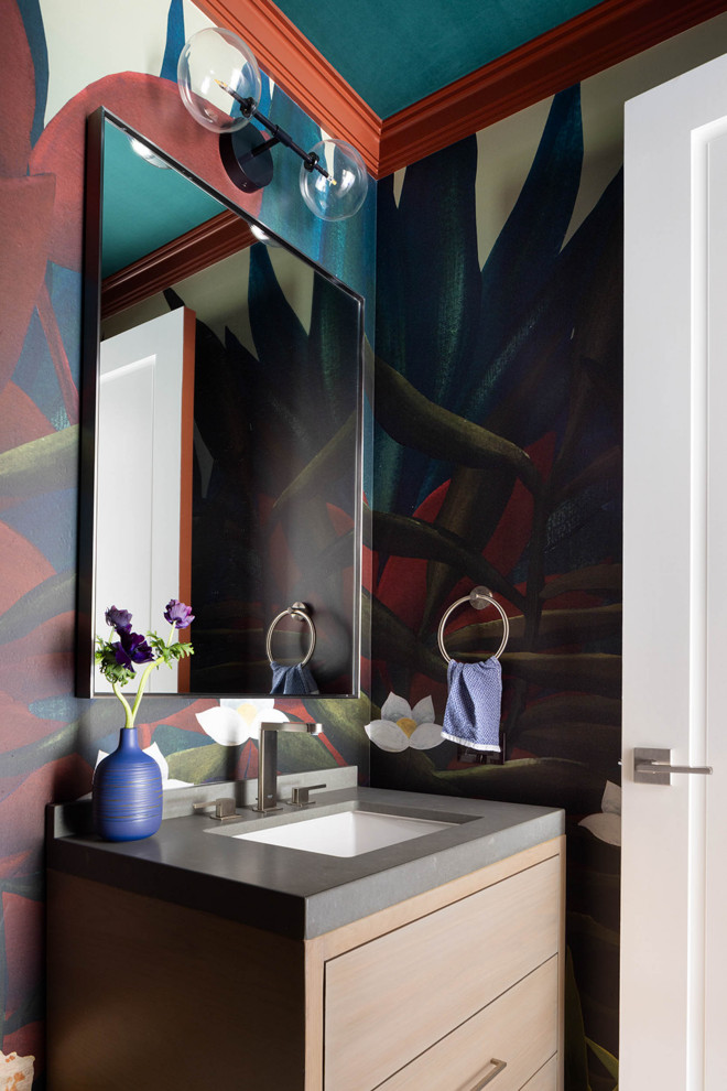 Design ideas for an expansive transitional powder room in San Francisco with multi-coloured walls, light hardwood floors, an undermount sink, marble benchtops, beige floor and grey benchtops.
