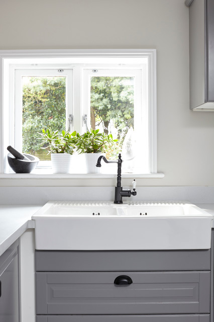 Contemporary-styled grey shaker kitchen transitional-kitchen
